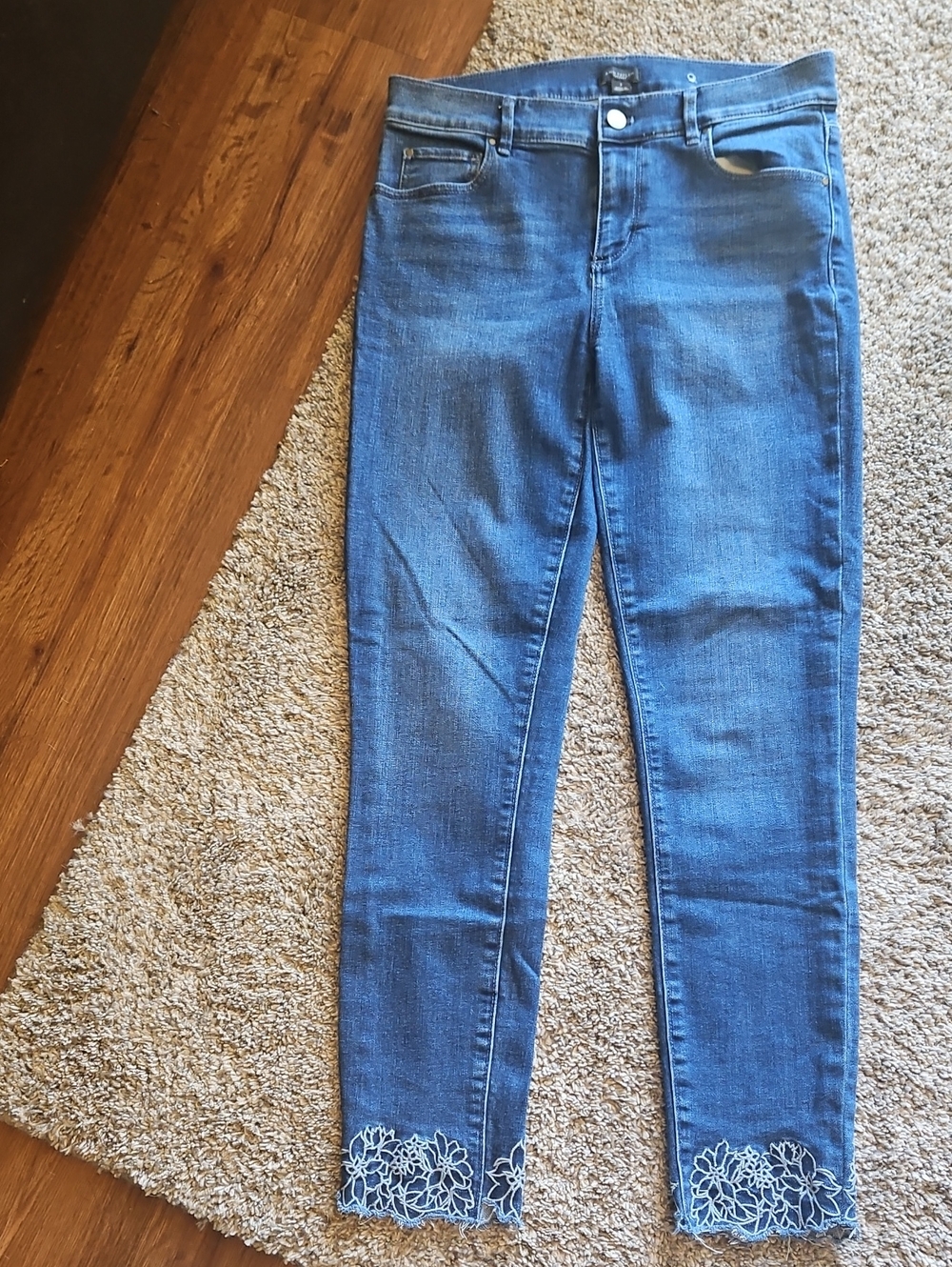 Women’s Blue Denim Ankle Jeans with Floral Hem